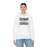 Woman wearing white 'Facts Don't Matter' graphic hoodie, ideal for casual wear and colder days.