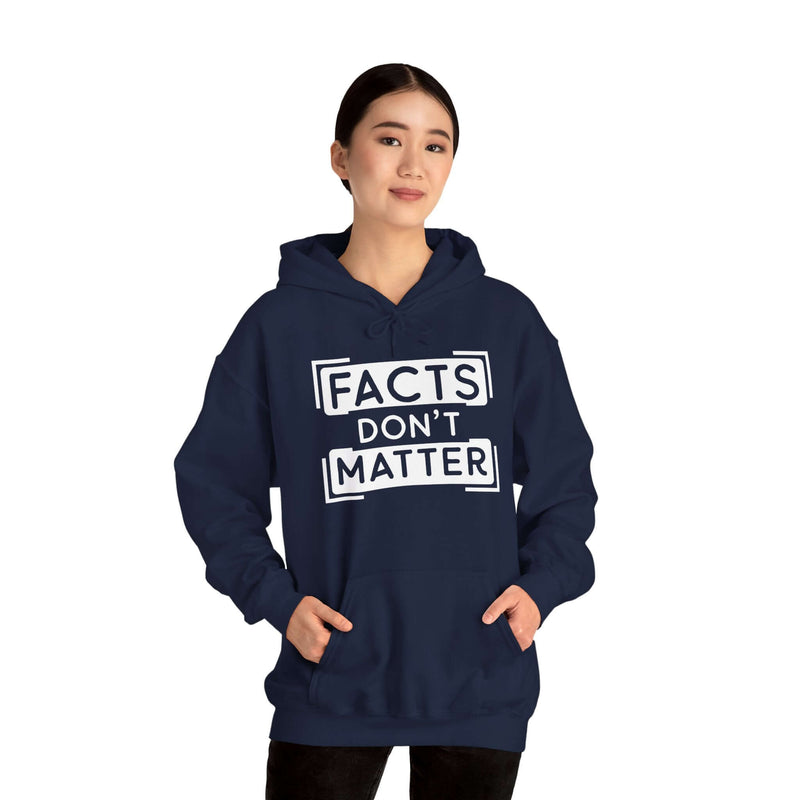 Woman wearing a navy 'Facts Don't Matter' graphic hoodie, ideal for casual and trendy winter wear.