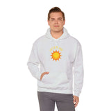 Man wearing Watch Me Shine Men's Graphic Hoodie with sun design, perfect for casual wear and cozy comfort.