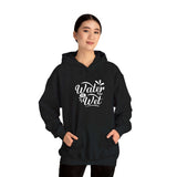 Black women's graphic hoodie with 'Water Is Wet' design, perfect for casual wear and cozy days.