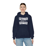 Woman wearing navy 'Facts Don't Matter' graphic hoodie, featuring spacious kangaroo pocket and adjustable hood.